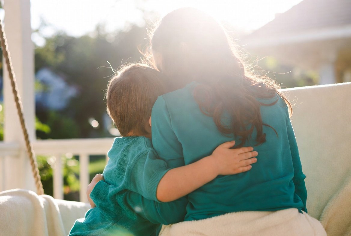 Warm embrace between parent and child